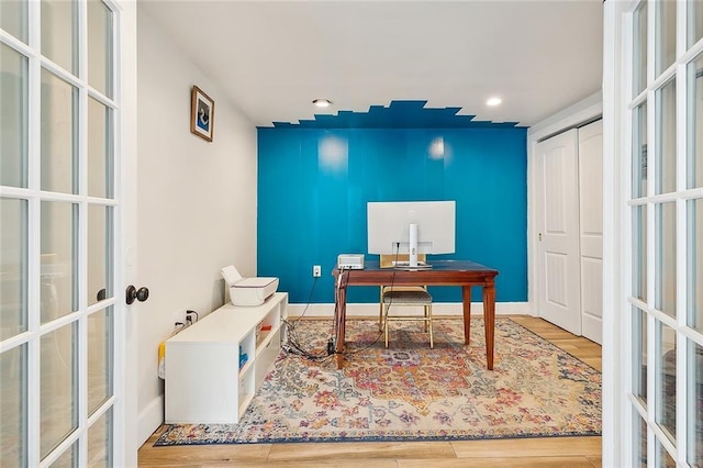 office featuring recessed lighting, french doors, baseboards, and wood finished floors