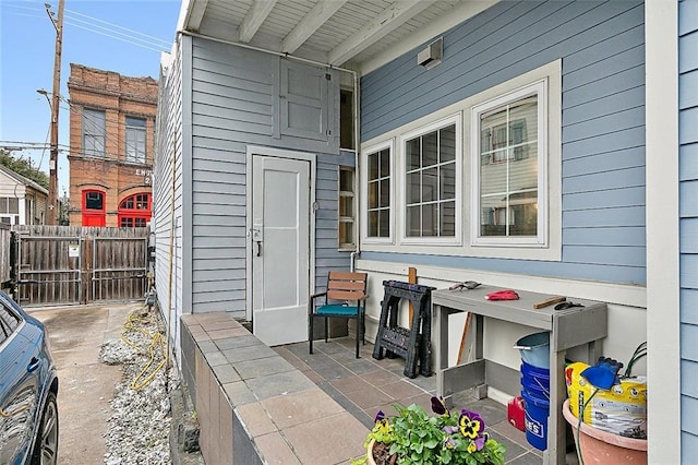 view of patio / terrace featuring fence