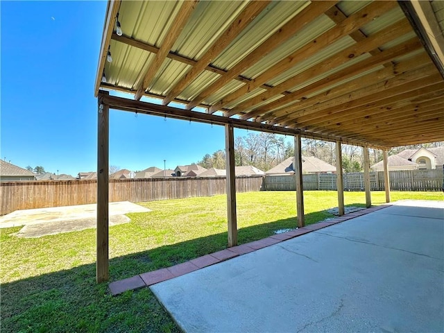 view of patio with a fenced backyard and a residential view
