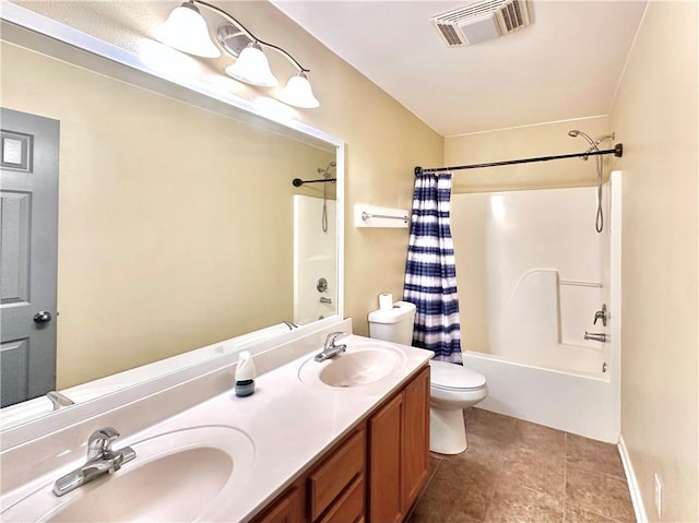 bathroom featuring toilet, shower / bath combo, a sink, and visible vents