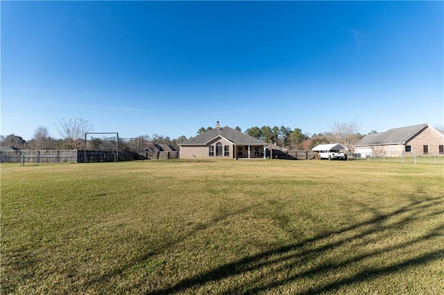 view of yard with fence