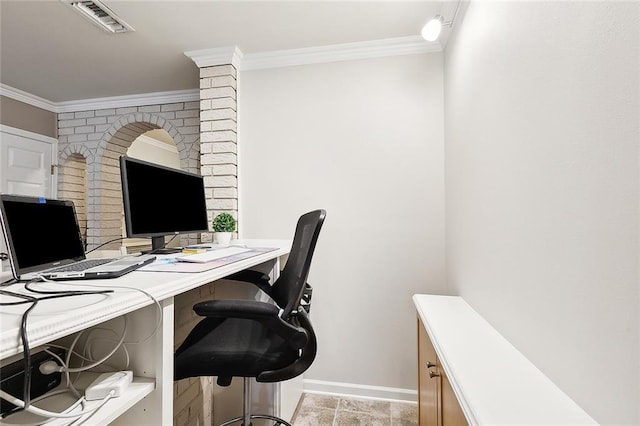 office area featuring baseboards, visible vents, and crown molding