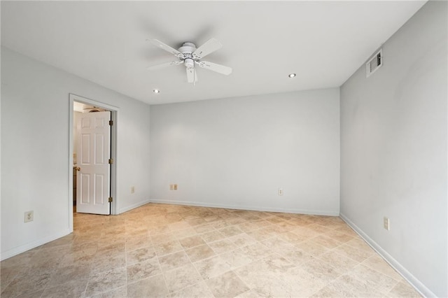 unfurnished room with ceiling fan, recessed lighting, visible vents, and baseboards