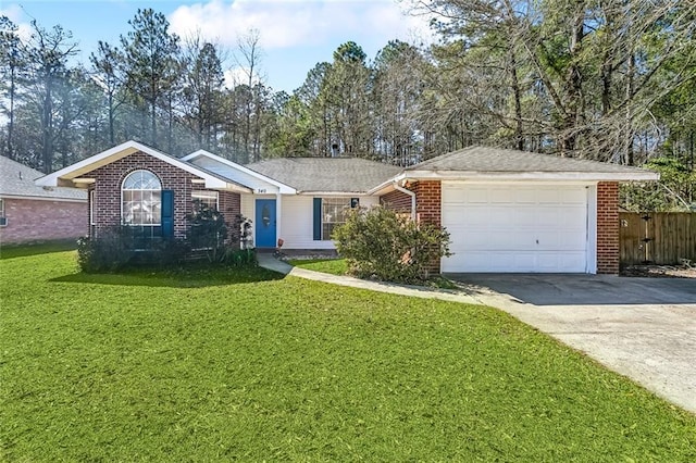 ranch-style house with a garage, brick siding, fence, driveway, and a front yard