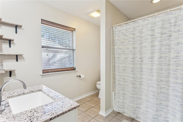 340 Colonial Ct, Mandeville, LA 70471 - bathroom featuring curtained shower, toilet, vanity, tile patterned flooring, and baseboards