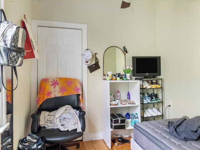 bedroom featuring wood finished floors