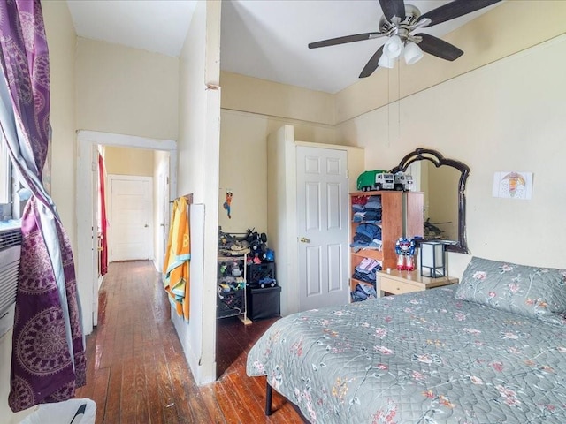 bedroom with hardwood / wood-style floors