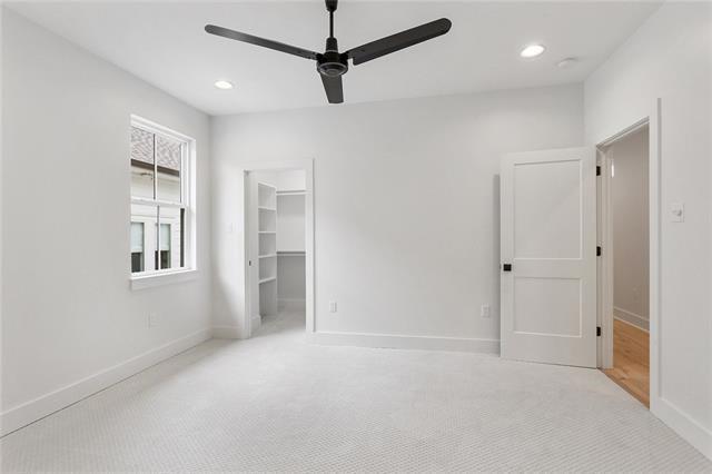 unfurnished bedroom with recessed lighting and baseboards