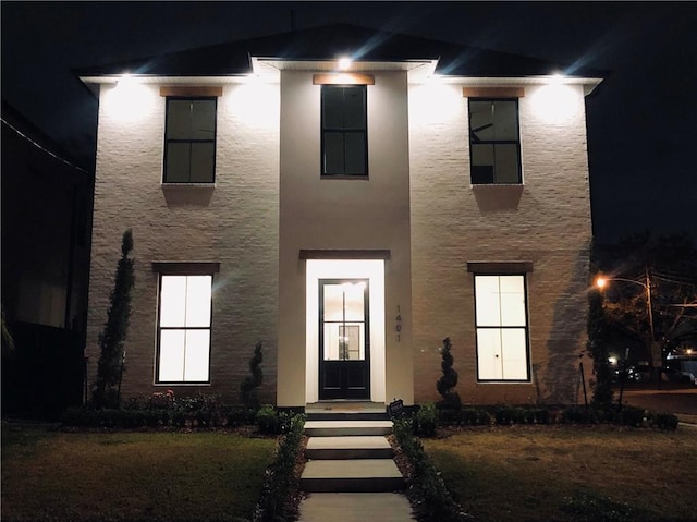 view of front facade with stucco siding