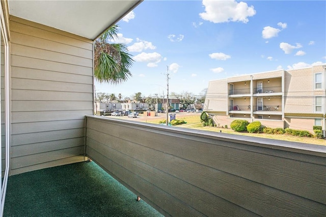 balcony featuring a residential view