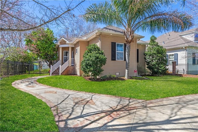 view of front of house with fence and a front yard