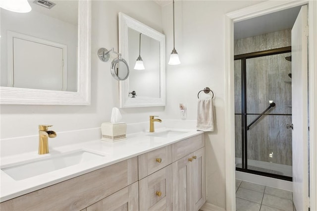 641 Petit Berdot Dr, Kenner, LA 70065 - full bath with double vanity, a shower stall, and tile patterned flooring