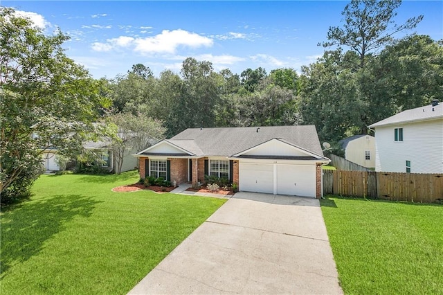 ranch-style house with fence, concrete driveway, an attached garage, a front yard, and brick siding