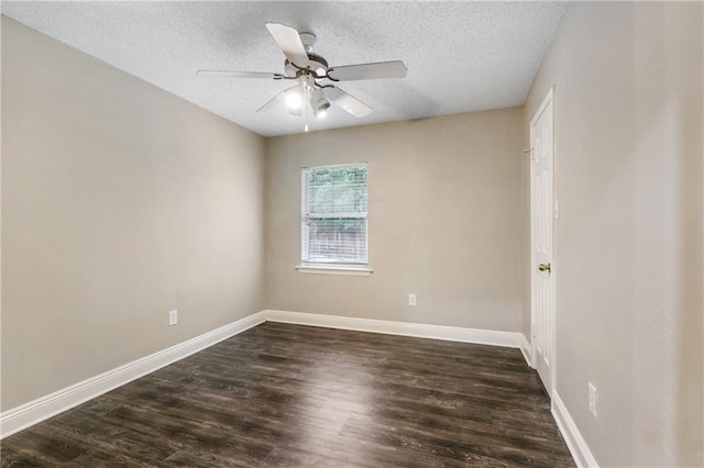 unfurnished room featuring ceiling fan, dark wood-type flooring, baseboards, and a textured ceiling