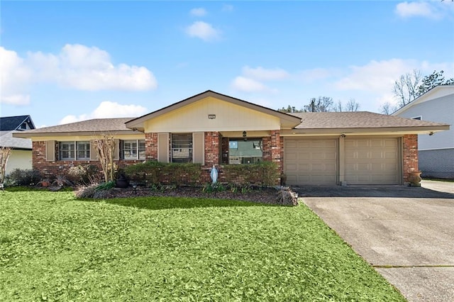 single story home featuring driveway, brick siding, a front lawn, and an attached garage