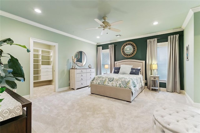 bedroom with baseboards, visible vents, crown molding, and carpet flooring