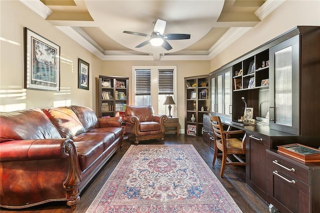 office area with ornamental molding, coffered ceiling, dark wood finished floors, and a ceiling fan