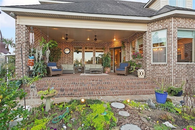 view of patio with ceiling fan and outdoor lounge area