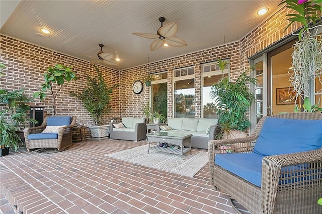 view of patio with ceiling fan and an outdoor living space