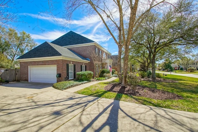 view of front of home featuring brick siding, roof with shingles, concrete driveway, an attached garage, and fence