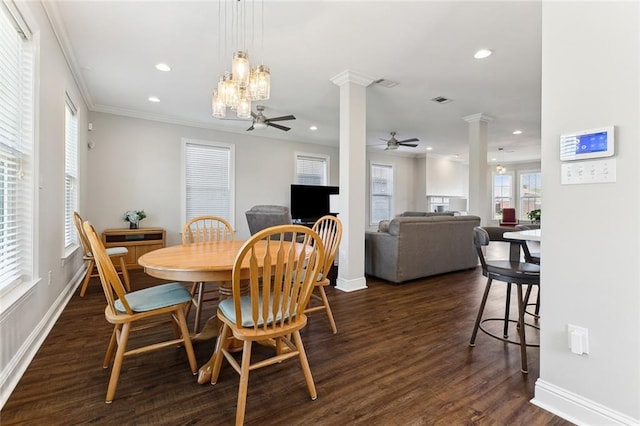 dining area with recessed lighting, dark wood-type flooring, a ceiling fan, ornamental molding, and decorative columns