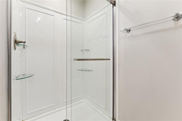 bathroom with a stall shower