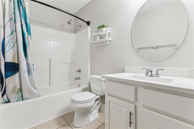 full bath featuring vanity, shower / tub combo, tile patterned flooring, and toilet