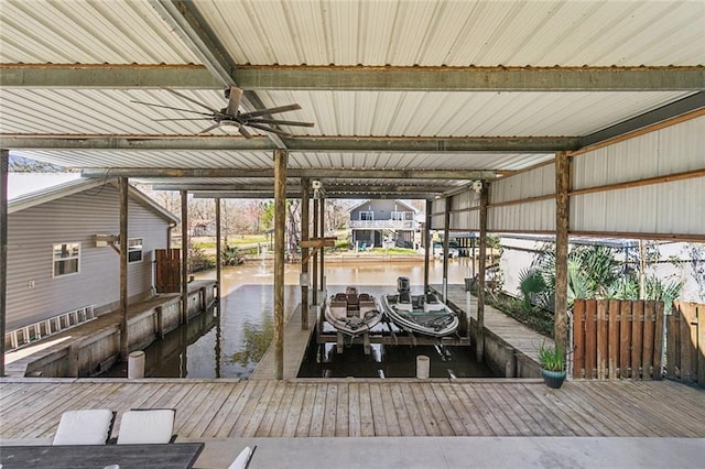 dock area featuring a water view and boat lift