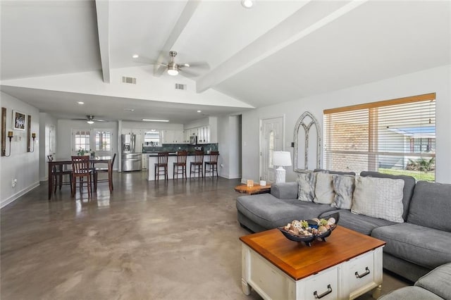 living room featuring vaulted ceiling with beams, a ceiling fan, concrete flooring, and visible vents