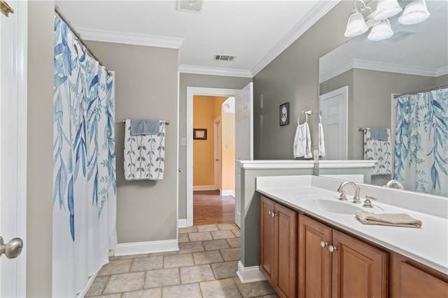 full bathroom with visible vents, crown molding, and vanity