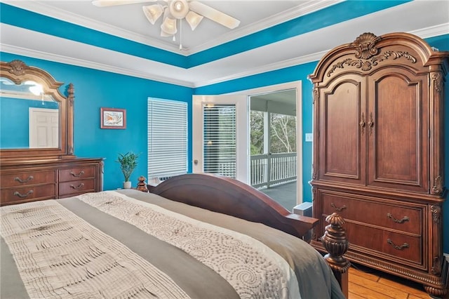 bedroom with crown molding, ceiling fan, light wood finished floors, and access to exterior