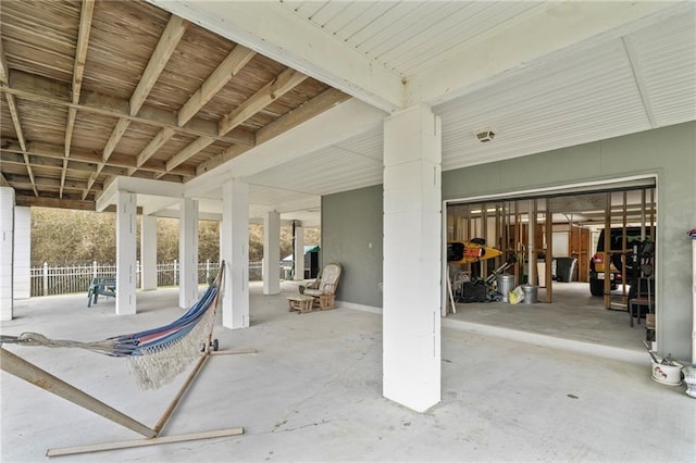 view of patio featuring fence