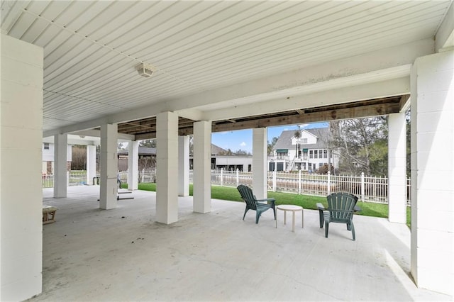 view of patio / terrace featuring fence