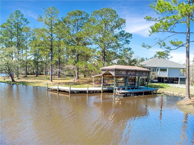 dock area featuring a water view