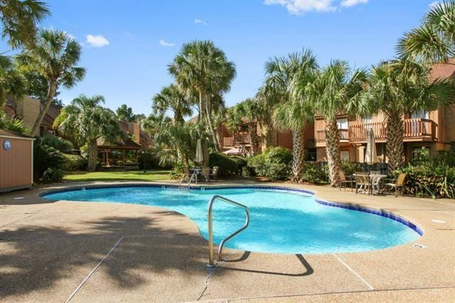 community pool with a patio