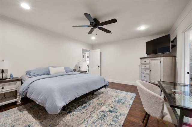 bedroom with crown molding, baseboards, dark wood-style flooring, and recessed lighting