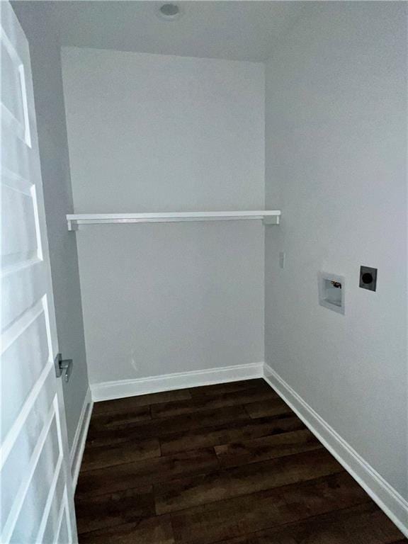 washroom featuring hookup for a washing machine, hookup for an electric dryer, laundry area, baseboards, and dark wood-style floors