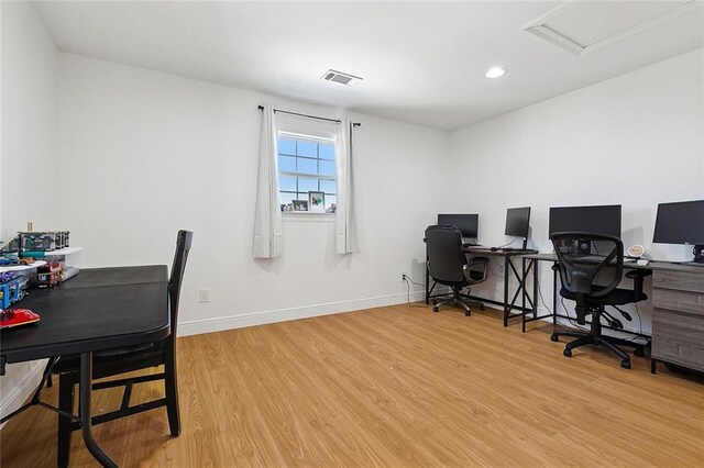 home office with baseboards, visible vents, wood finished floors, and recessed lighting