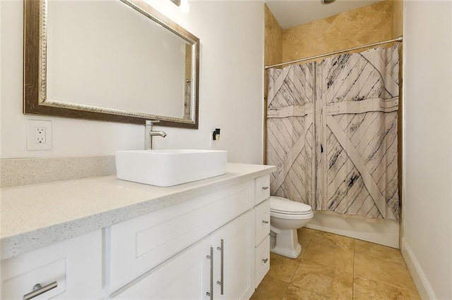 bathroom featuring shower / bath combo, vanity, and toilet