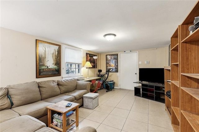 living room with light tile patterned flooring