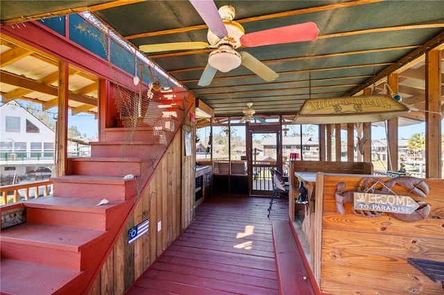 wooden deck with ceiling fan