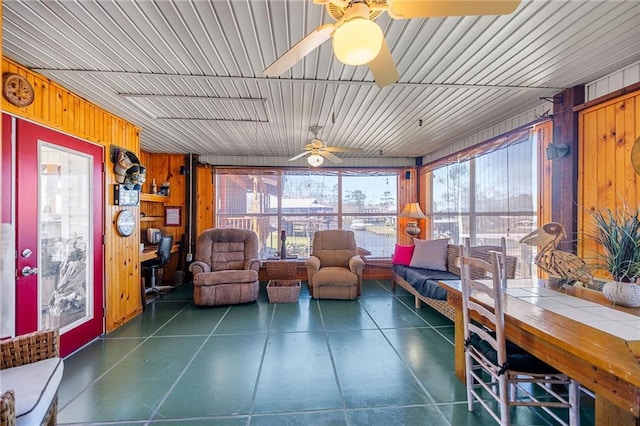 sunroom / solarium with ceiling fan