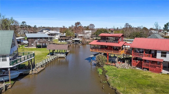 exterior space with a residential view and a dock