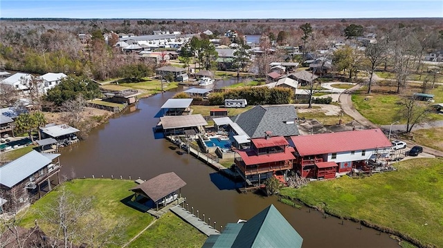 aerial view featuring a water view and a residential view