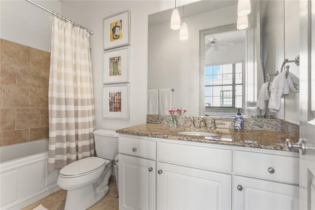 full bath featuring shower / bath combo, a ceiling fan, toilet, tile patterned floors, and vanity