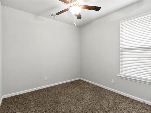 749 Pelican Bay Dr, Slidell, LA 70461 - carpeted empty room with ceiling fan, visible vents, and baseboards