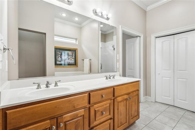 bathroom featuring double vanity, ornamental molding, a sink, and tile patterned floors