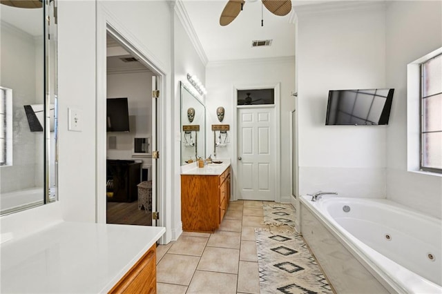 full bath with crown molding, visible vents, vanity, tile patterned flooring, and a tub with jets