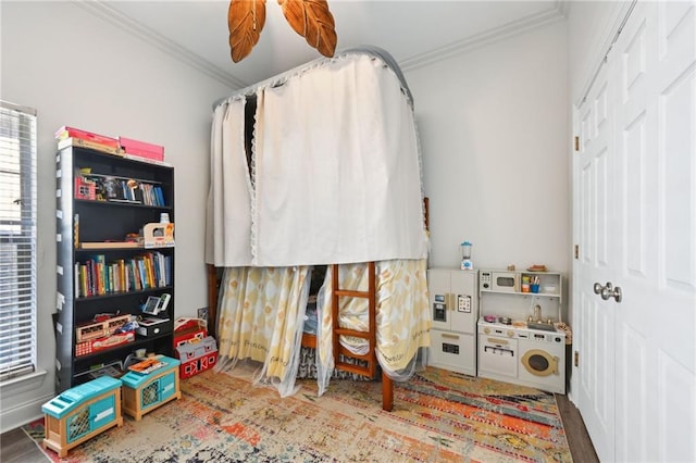 bedroom featuring crown molding