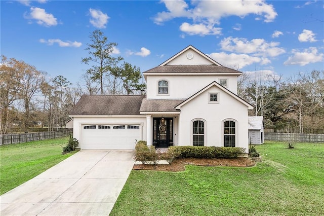 view of front of home featuring a garage, a front yard, fence, and stucco siding